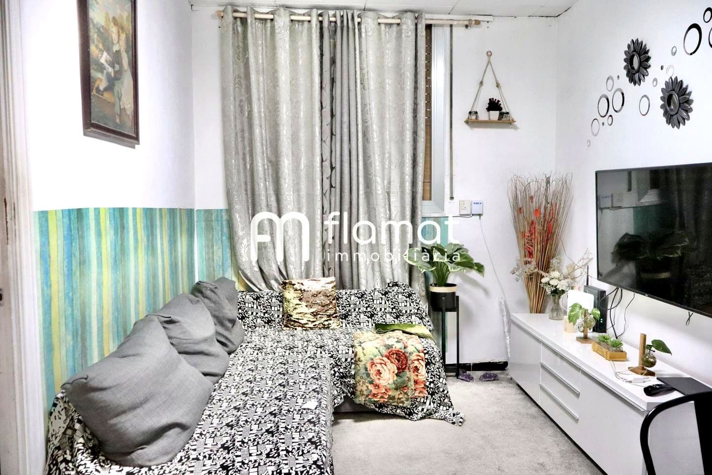 Piso y local en Av. Pallaresa 2